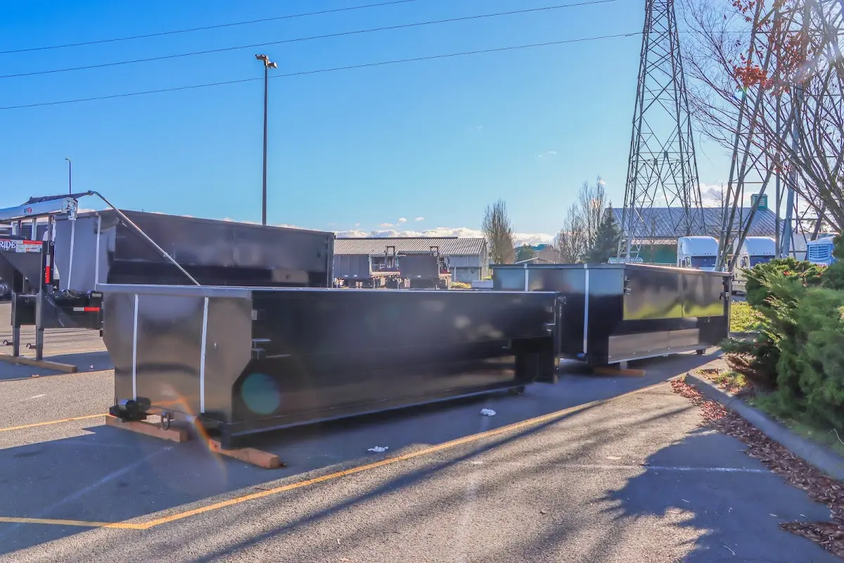 Roll-off dumpster ready for waste disposal at job site for 20 Yard Dumpster Rental in Athens